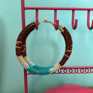 Wired wrapped beaded hoops.